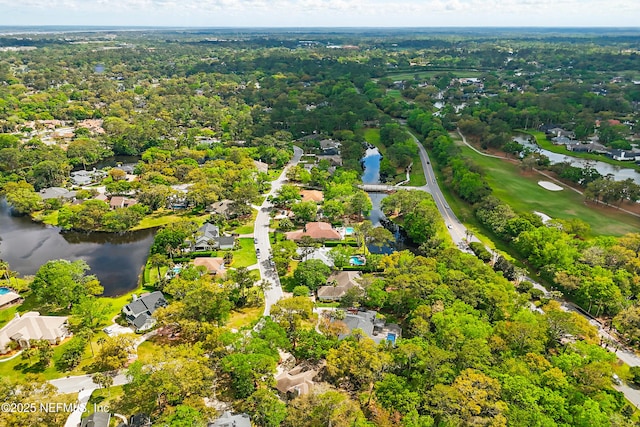 bird's eye view with a forest view, a residential view, and a water view