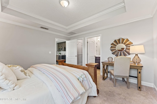bedroom featuring light carpet, visible vents, ornamental molding, and a tray ceiling