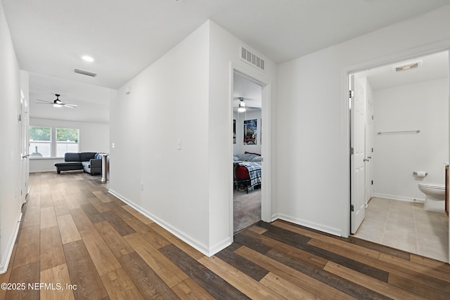 6387 Barrington Cv Ln, Jacksonville, FL 32218 - corridor with hardwood / wood-style flooring and baseboards