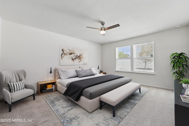 6387 Barrington Cv Ln, Jacksonville, FL 32218 - carpeted bedroom with a textured ceiling and a ceiling fan