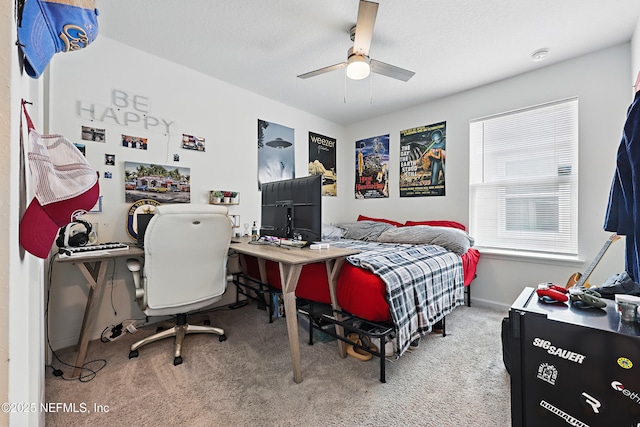 6387 Barrington Cv Ln, Jacksonville, FL 32218 - carpeted bedroom featuring baseboards, an office area, and a ceiling fan