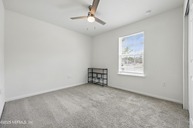 6387 Barrington Cv Ln, Jacksonville, FL 32218 - spare room with carpet floors, a ceiling fan, and baseboards