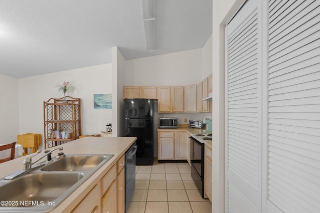 38 Talavera Ct, Saint Augustine, FL 32086 - kitchen featuring light brown cabinets, freestanding refrigerator, dishwashing machine, a sink, and electric range oven