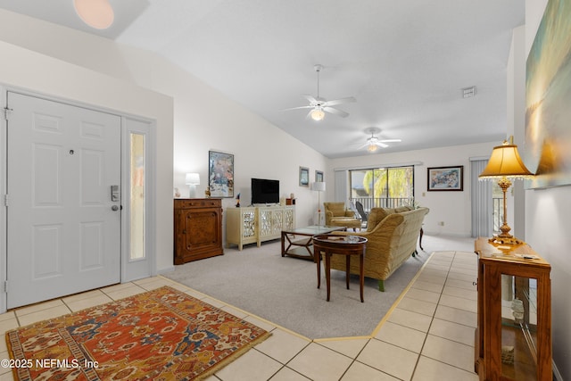 38 Talavera Ct, Saint Augustine, FL 32086 - living area featuring light tile patterned floors, visible vents, lofted ceiling, light colored carpet, and ceiling fan
