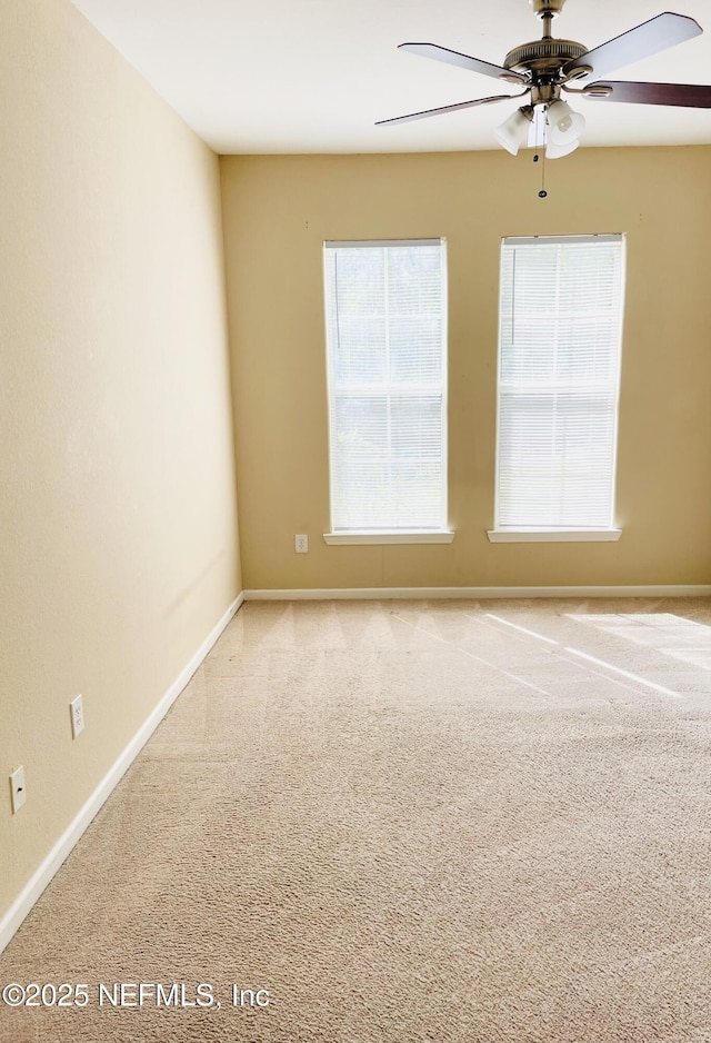 8290 Gate Pkwy W Unit 504, Jacksonville, FL 32216 - unfurnished room featuring baseboards and ceiling fan