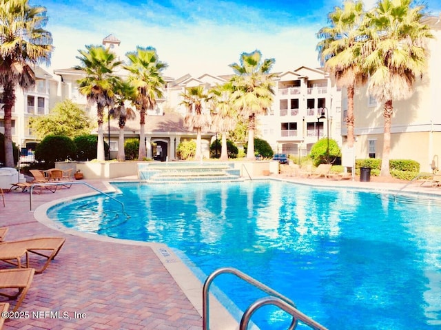 8290 Gate Pkwy W Unit 504, Jacksonville, FL 32216 - community pool featuring a patio area