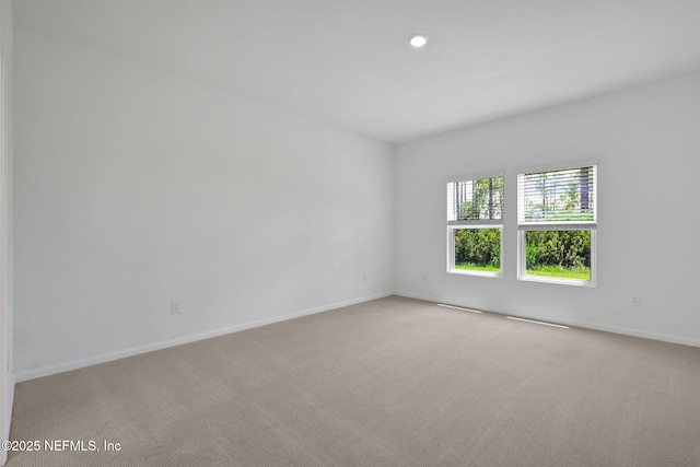 356 Salazar St, Saint Augustine, FL 32095 - unfurnished room with light carpet and recessed lighting