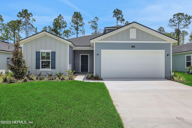 356 Salazar St, Saint Augustine, FL 32095 - ranch-style house featuring board and batten siding, a front lawn, driveway, and an attached garage