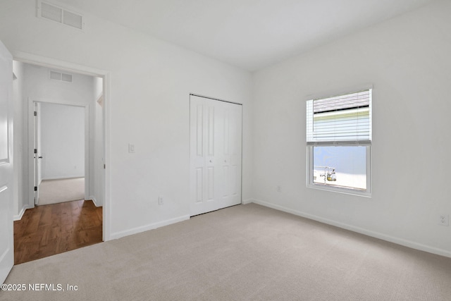 356 Salazar St, Saint Augustine, FL 32095 - unfurnished bedroom featuring carpet floors and a closet