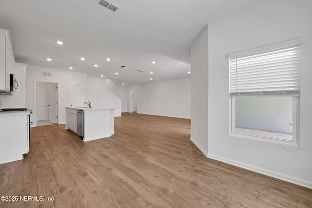 356 Salazar St, Saint Augustine, FL 32095 - unfurnished living room with recessed lighting and light wood-type flooring