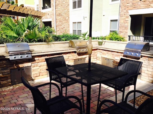 8539 Gate Pkwy W Unit 1616, Jacksonville, FL 32216 - view of patio featuring grilling area and area for grilling