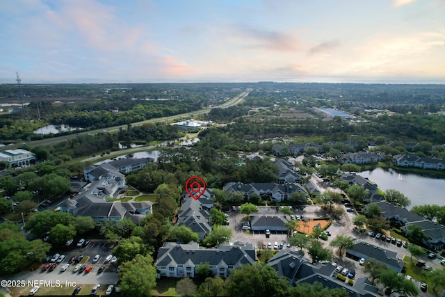 35211 Harbour Vista Cir, Saint Augustine, FL 32080 - aerial view at dusk featuring a water view and a residential view