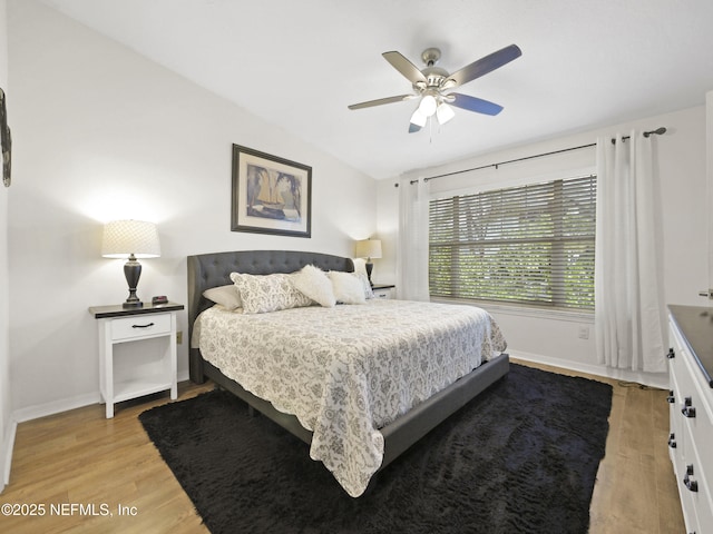 35211 Harbour Vista Cir, Saint Augustine, FL 32080 - bedroom featuring light wood-style flooring, ceiling fan, and baseboards