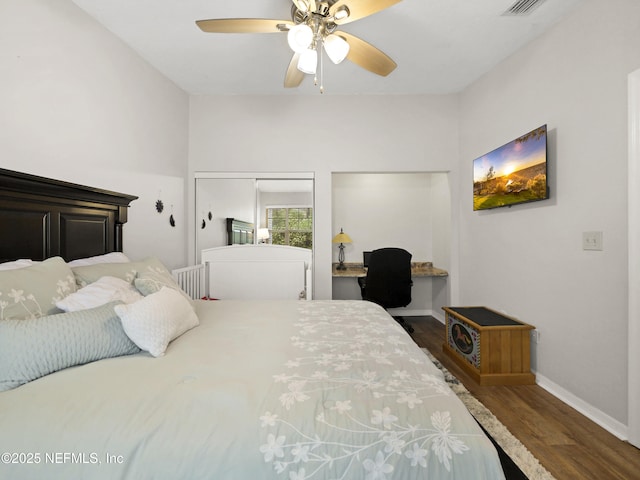 35211 Harbour Vista Cir, Saint Augustine, FL 32080 - bedroom featuring visible vents, baseboards, ceiling fan, and wood finished floors