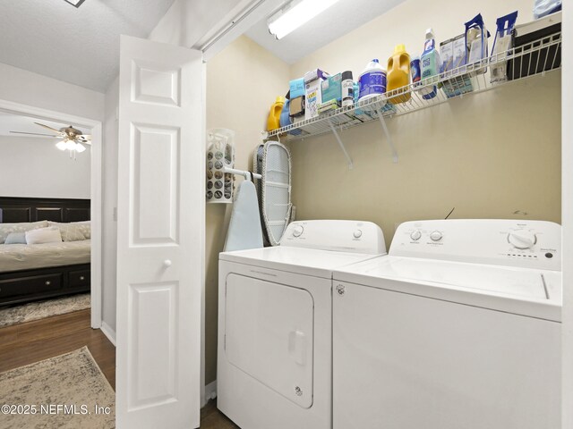 35211 Harbour Vista Cir, Saint Augustine, FL 32080 - laundry area featuring a ceiling fan, laundry area, dark wood-style floors, and washing machine and dryer