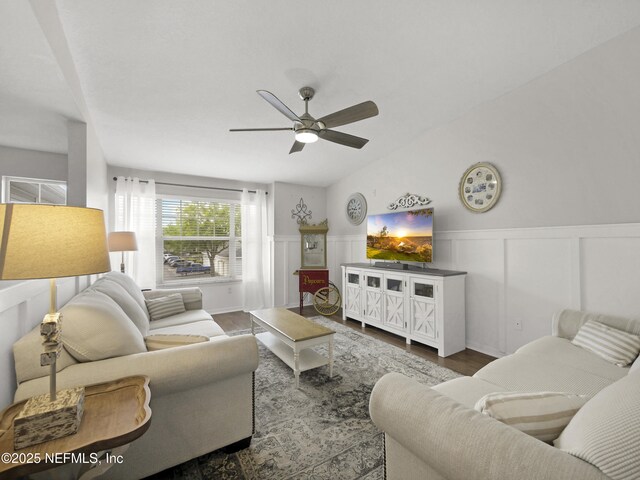 35211 Harbour Vista Cir, Saint Augustine, FL 32080 - living area featuring wainscoting, ceiling fan, a decorative wall, and wood finished floors