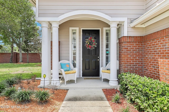 2011 Pond Ridge Ct Unit 1201, Fleming Island, FL 32003 - entrance to property featuring covered porch and brick siding