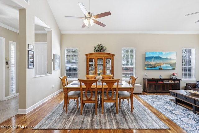 2011 Pond Ridge Ct Unit 1201, Fleming Island, FL 32003 - dining space with a ceiling fan, wood finished floors, crown molding, baseboards, and vaulted ceiling