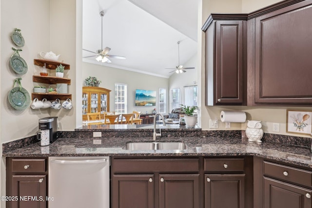 2011 Pond Ridge Ct Unit 1201, Fleming Island, FL 32003 - kitchen with dishwasher, a sink, ceiling fan, dark brown cabinets, and vaulted ceiling