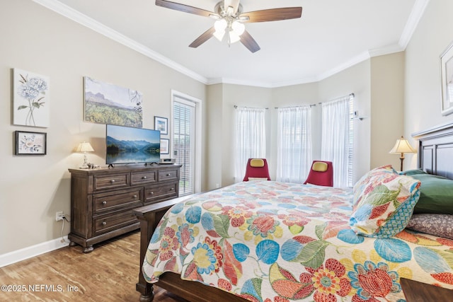 2011 Pond Ridge Ct Unit 1201, Fleming Island, FL 32003 - bedroom with light wood finished floors, multiple windows, crown molding, baseboards, and a ceiling fan