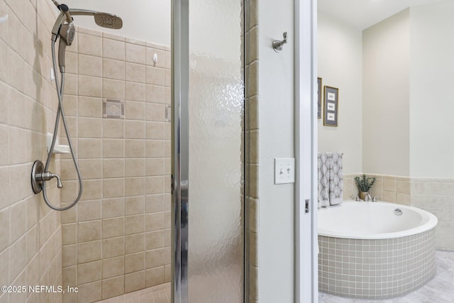 2011 Pond Ridge Ct Unit 1201, Fleming Island, FL 32003 - full bathroom with a shower stall and a bath