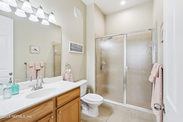 2011 Pond Ridge Ct Unit 1201, Fleming Island, FL 32003 - full bath with vanity, tile patterned floors, a stall shower, and toilet
