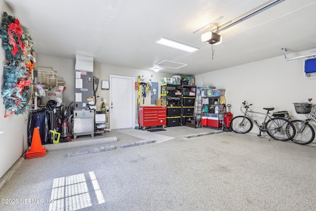 2011 Pond Ridge Ct Unit 1201, Fleming Island, FL 32003 - garage featuring a garage door opener and electric panel