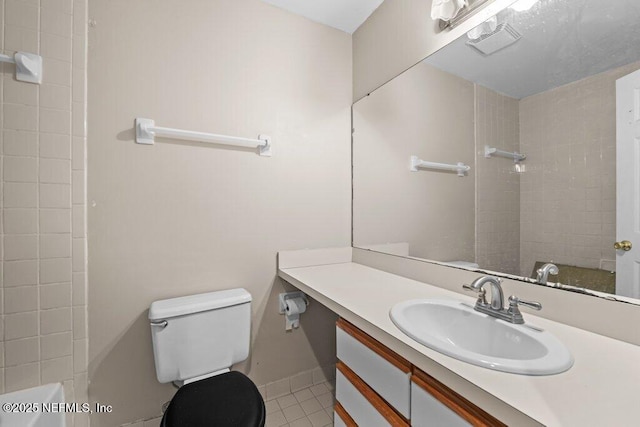 1604 Arcadia Dr Unit 209, Jacksonville, FL 32207 - bathroom featuring tile patterned floors, toilet, baseboards, and vanity