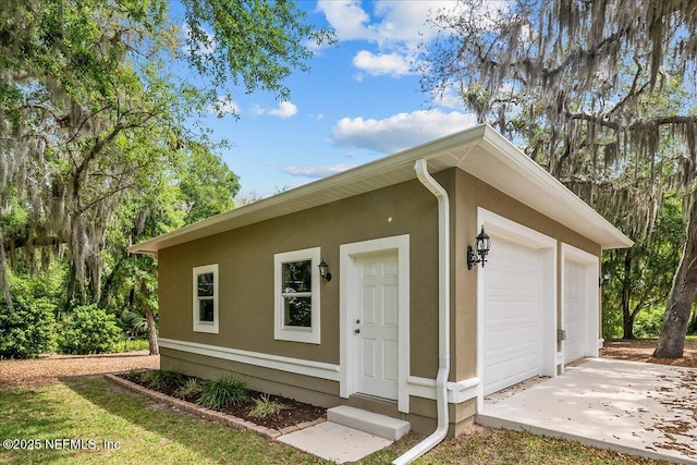 226 Crystal Cove Dr, Palatka, FL 32177 - view of front of home featuring stucco siding