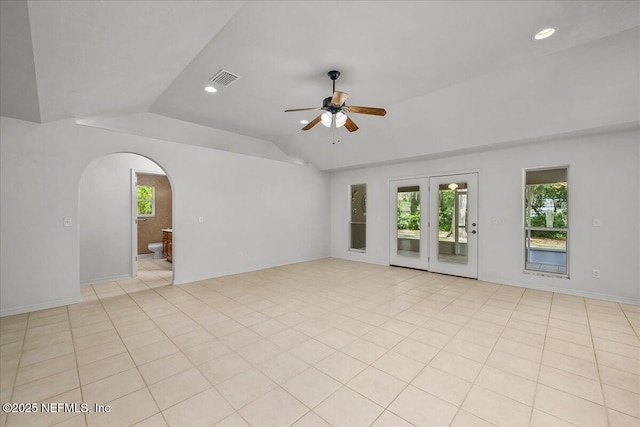 226 Crystal Cove Dr, Palatka, FL 32177 - empty room featuring lofted ceiling, recessed lighting, arched walkways, visible vents, and a ceiling fan