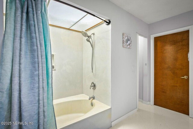 1216 Radis Pl, Jacksonville, FL 32225 - bathroom with shower / tub combo with curtain and tile patterned flooring
