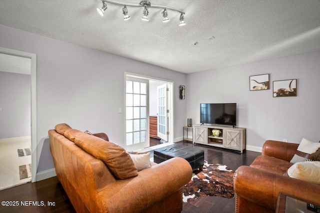1216 Radis Pl, Jacksonville, FL 32225 - living room with baseboards, wood finished floors, and a textured ceiling