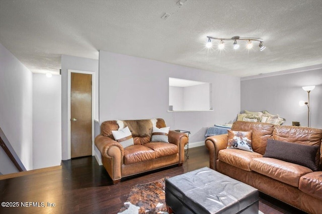1216 Radis Pl, Jacksonville, FL 32225 - living area featuring baseboards, a textured ceiling, and wood finished floors