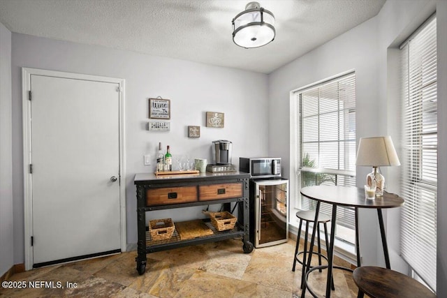 1216 Radis Pl, Jacksonville, FL 32225 - office space featuring a textured ceiling and beverage cooler