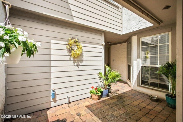 1216 Radis Pl, Jacksonville, FL 32225 - view of patio / terrace featuring visible vents