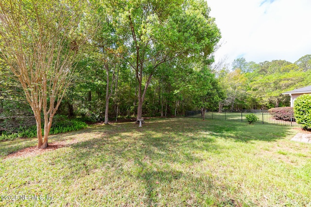 view of yard featuring fence