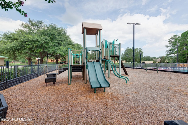 community play area featuring fence