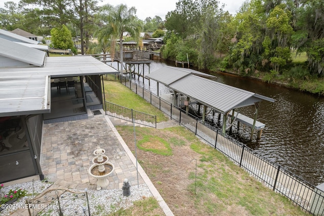 111 Magnolia Dr, East Palatka, FL 32131 - view of yard with a boat dock, a water view, and fence