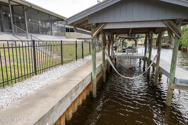 111 Magnolia Dr, East Palatka, FL 32131 - view of dock with a water view, boat lift, and fence