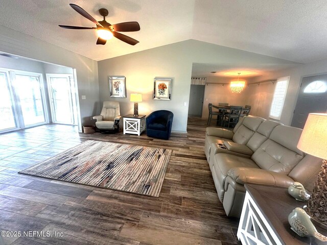 111 Magnolia Dr, East Palatka, FL 32131 - living room featuring a textured ceiling, ceiling fan, wood finished floors, and vaulted ceiling