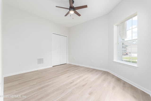 2895 Cross Creek Dr, Green Cove Springs, FL 32043 - spare room with baseboards, ceiling fan, visible vents, and light wood-style floors