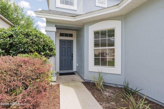 2895 Cross Creek Dr, Green Cove Springs, FL 32043 - doorway to property with stucco siding