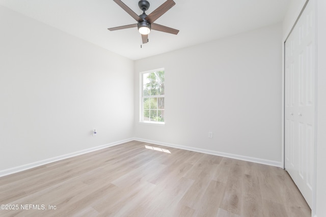 2895 Cross Creek Dr, Green Cove Springs, FL 32043 - spare room featuring light wood finished floors, baseboards, and a ceiling fan
