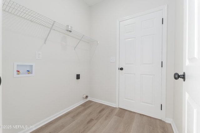 2895 Cross Creek Dr, Green Cove Springs, FL 32043 - laundry area featuring washer hookup, laundry area, light wood-style floors, and electric dryer hookup