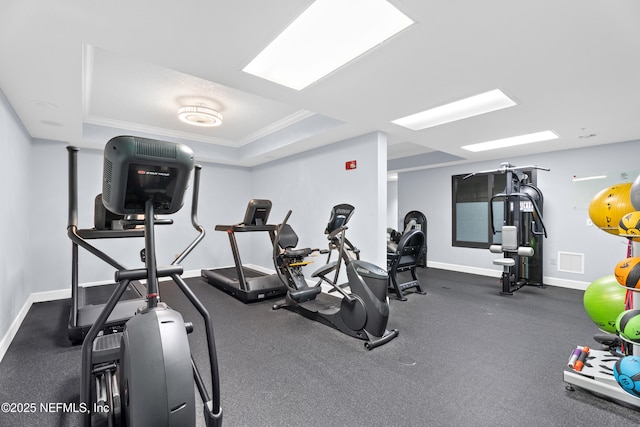 1478 Riverplace Blvd Unit 803, Jacksonville, FL 32207 - exercise room with baseboards, visible vents, crown molding, and a raised ceiling