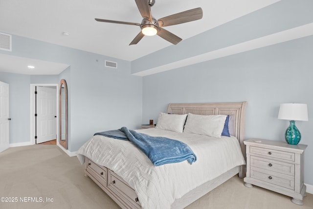 1478 Riverplace Blvd Unit 803, Jacksonville, FL 32207 - bedroom featuring a ceiling fan, light carpet, baseboards, and visible vents
