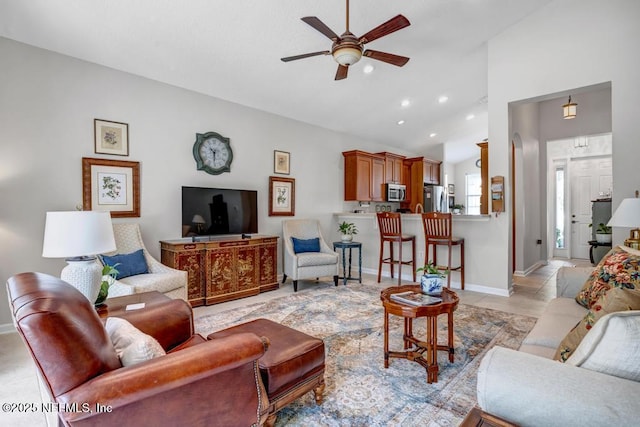714 Copperhead Cir, Saint Augustine, FL 32092 - living area with baseboards, recessed lighting, a ceiling fan, lofted ceiling, and light tile patterned floors
