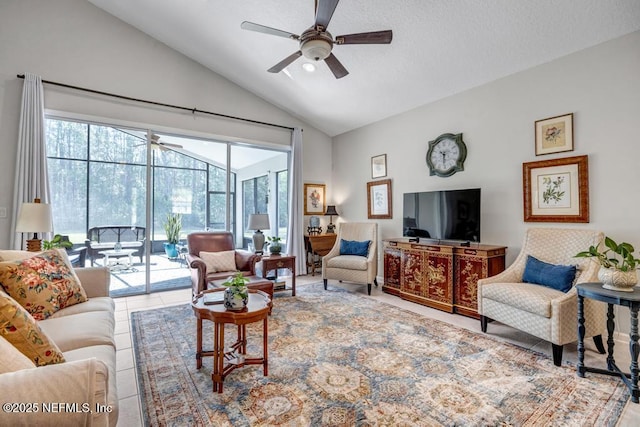 714 Copperhead Cir, Saint Augustine, FL 32092 - living room featuring a ceiling fan, a sunroom, tile patterned floors, and vaulted ceiling