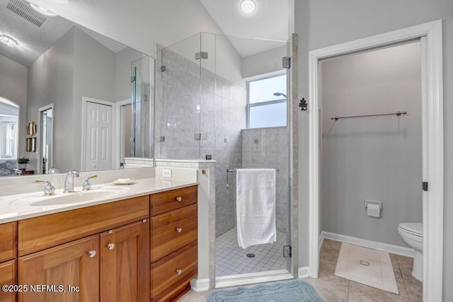 714 Copperhead Cir, Saint Augustine, FL 32092 - full bathroom with visible vents, a shower stall, toilet, vanity, and tile patterned flooring