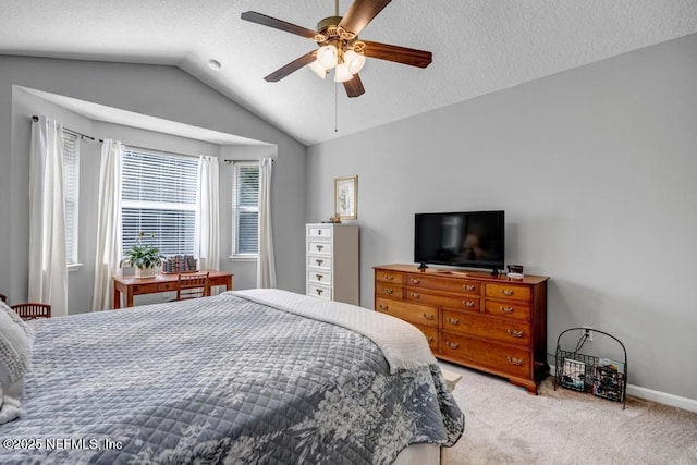 714 Copperhead Cir, Saint Augustine, FL 32092 - bedroom featuring lofted ceiling, light colored carpet, baseboards, a textured ceiling, and ceiling fan